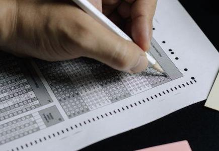 Student filling out bubble sheet